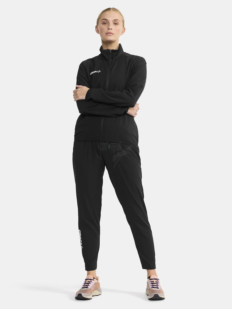 Damski dres treningowy Craft Rush 2.0 w kolorze czarnym – taliowana bluza rozpinana i techniczne spodnie sportowe z białym logo Craft.