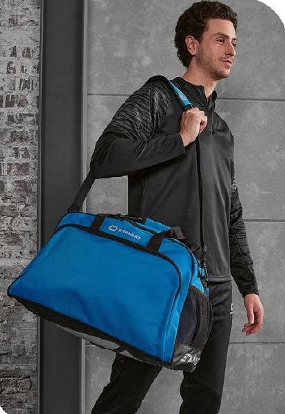 Męski dres treningowy Stanno Bolt – czarna bluza treningowa z krótkim zamkiem 1/4 i szaro-czarną grafiką na ramionach oraz dopasowane czarne spodnie dresowe.