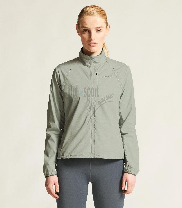 Damska kurtka biegowa Craft Essence Wind Jacket w kolorze jasnopopielatym – lekka wiatrówka treningowa.
