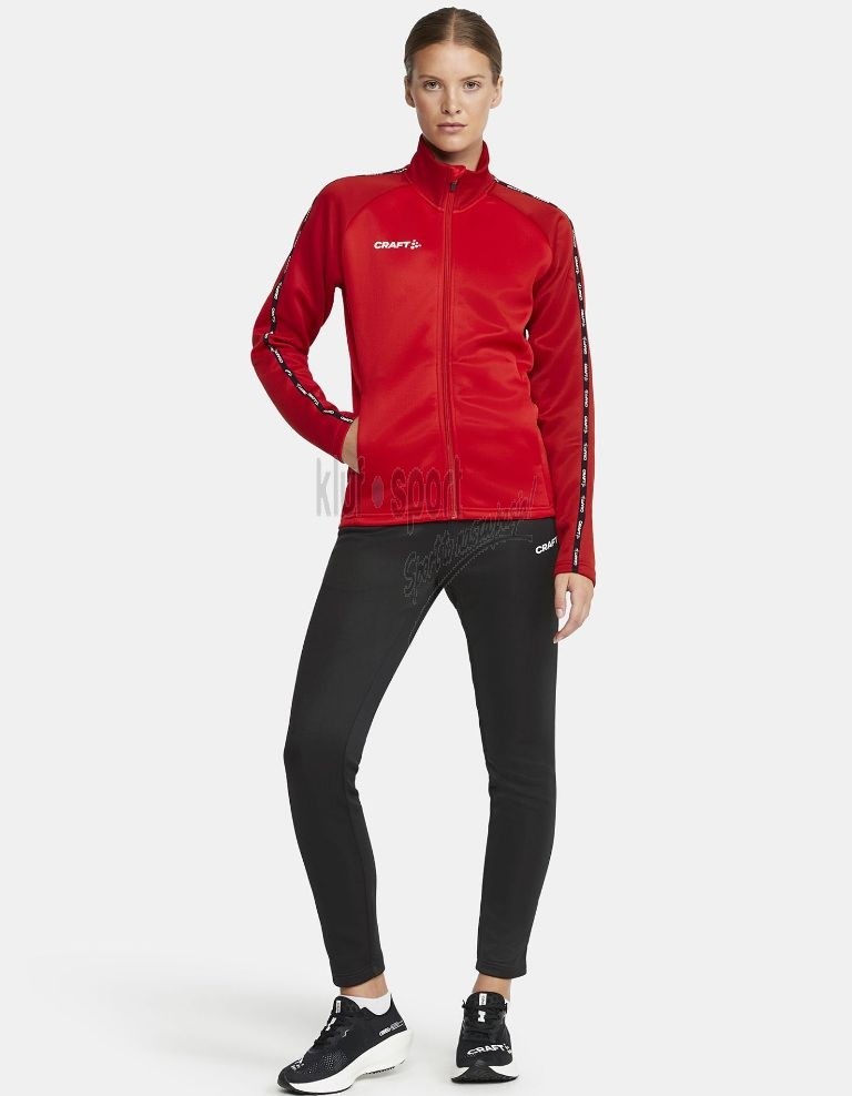 Damski dres sportowy Craft Squad 2.0 – czerwona bluza treningowa rozpinana na zamek oraz czarne spodnie z białym logo Craft.