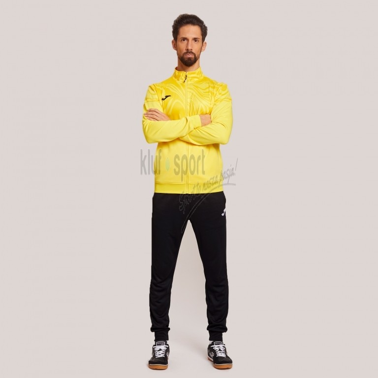 Męski dres treningowy Joma Lion II – żółta bluza sportowa z pełnym zamkiem i czarnym logowaniem na rękawach oraz czarne spodnie dresowe.