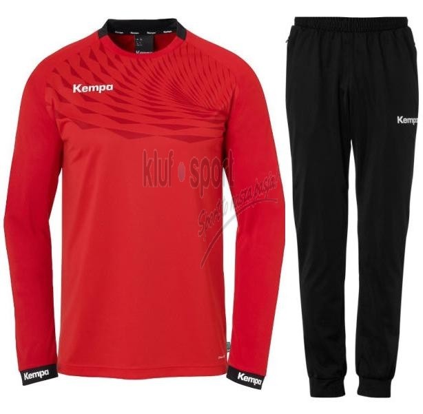 Męski dres treningowy Kempa Wave 26 – czerwona bluza typu training top z asymetrycznym wzorem fali oraz czarne spodnie treningowe Kempa Lite.