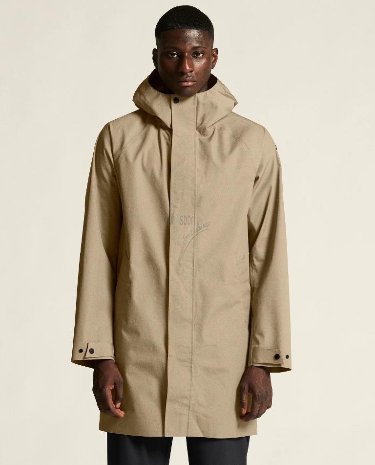 Beżowy płaszcz przeciwdeszczowy Craft Urban Shell Coat Uni – długi hardshell męski z kapturem.