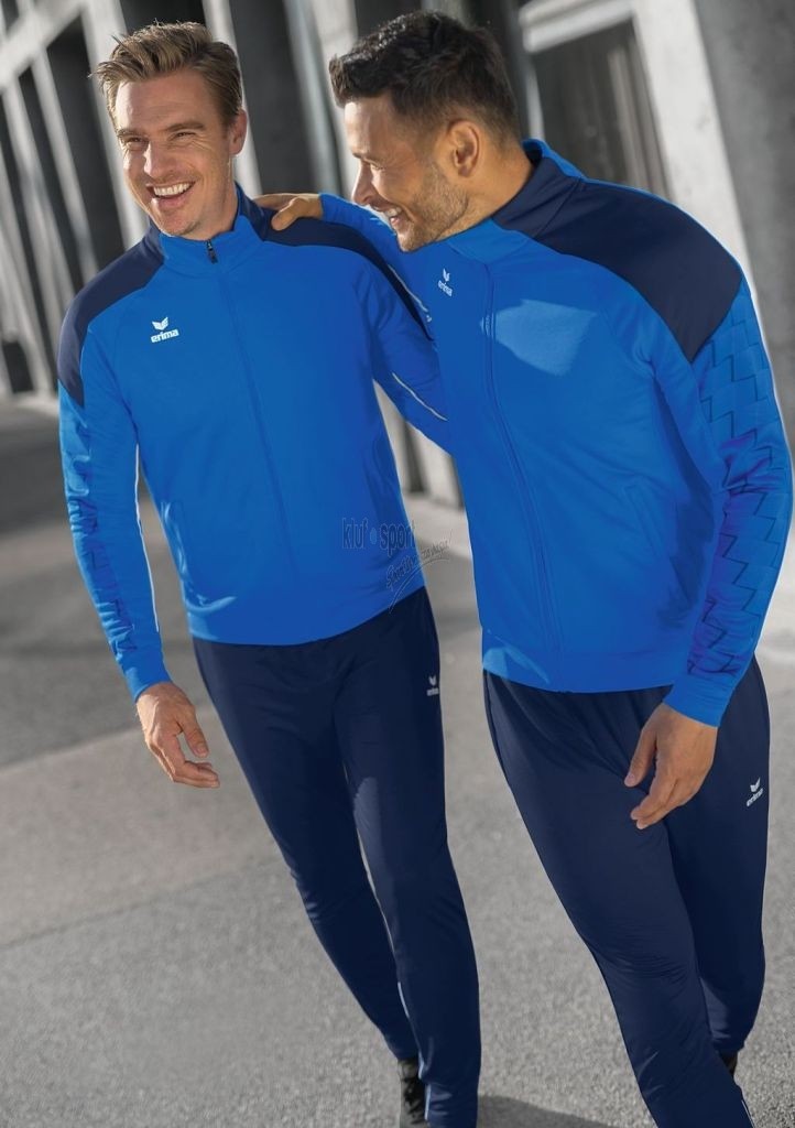 Męski dres treningowy Erima Evo Star w kolorze turkusowym – bluza zapinana na zamek i granatowe spodnie sportowe.