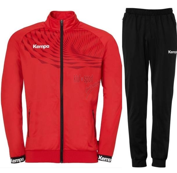 Męski dres treningowy Kempa Wave 26 – czerwona bluza rozpinana na pełny zamek z asymetrycznym wzorem Wave i czarne spodnie treningowe Kempa Lite.
