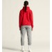 Damski dres bawełniany Craft Community 2.0 – czerwona bluza z kapturem zapinana na zamek oraz jasnoszare spodnie dresowe ze ściągaczami.