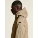 Beżowy płaszcz przeciwdeszczowy Craft Urban Shell Coat Uni – długi hardshell męski z kapturem.