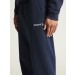 Granatowe spodnie dresowe męskie Craft Community 2.0